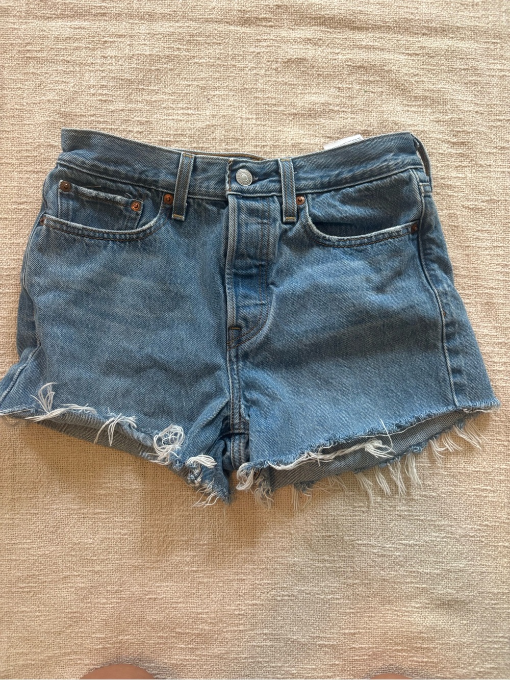 Levi’s cut offs. Size 27 wedgie.